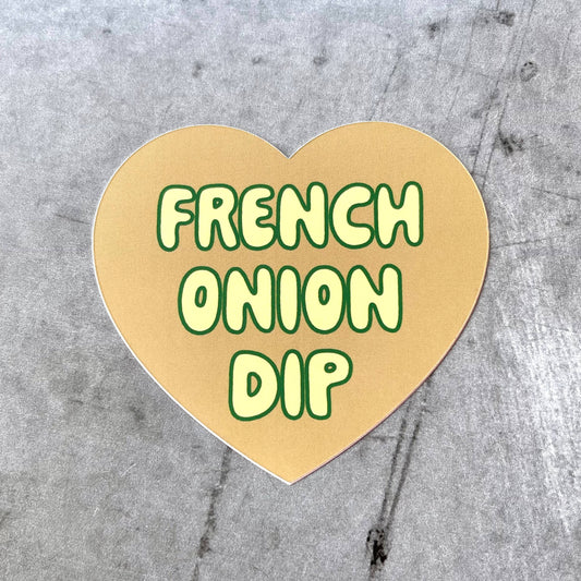 Tan, heart-shaped sticker with "French Onion Dip" in light yellow (with green outline) bubble letters.