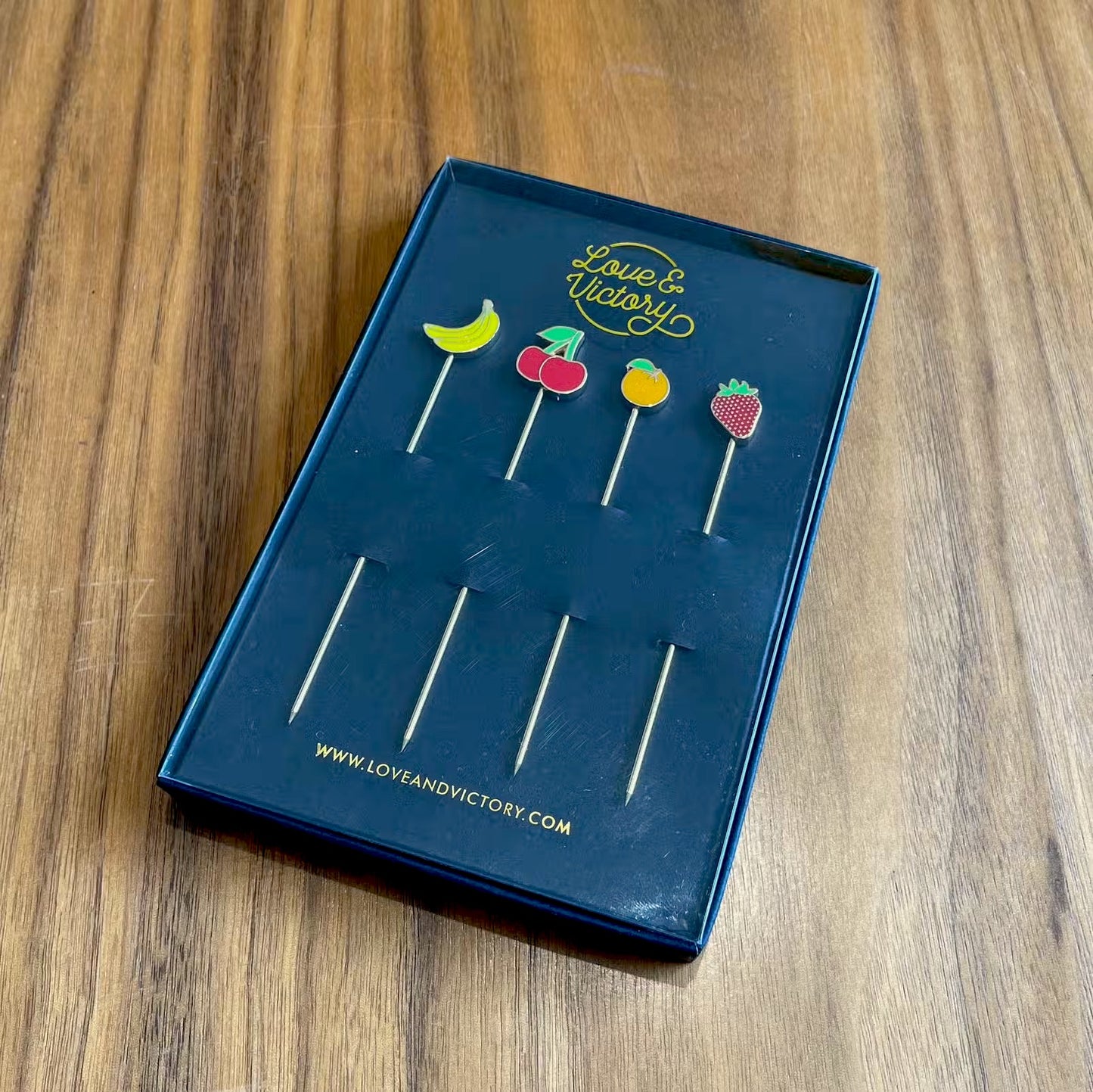 Fruit Cocktail Picks in display box.