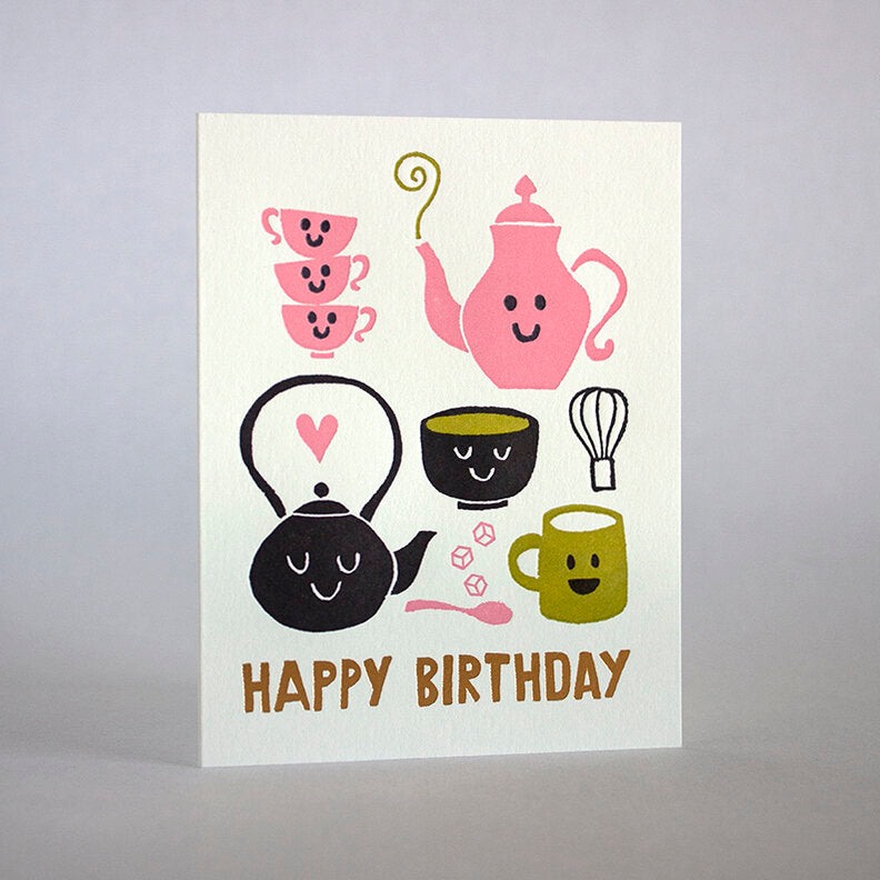 Birthday greeting card with different teapots + teacups.