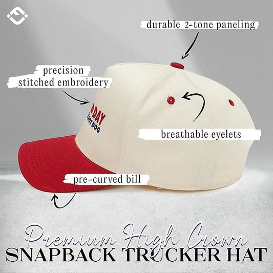 Red and beige snapback trucker hat with text highlighting features on a gray background