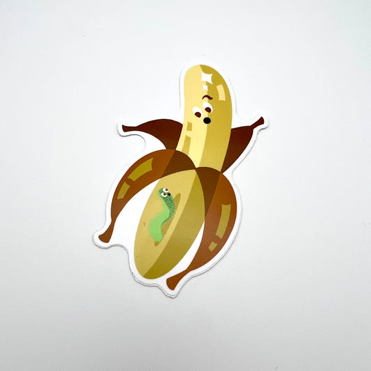 Sticker of peeled banana with a face looking at a worm that is crawling up the banana.
