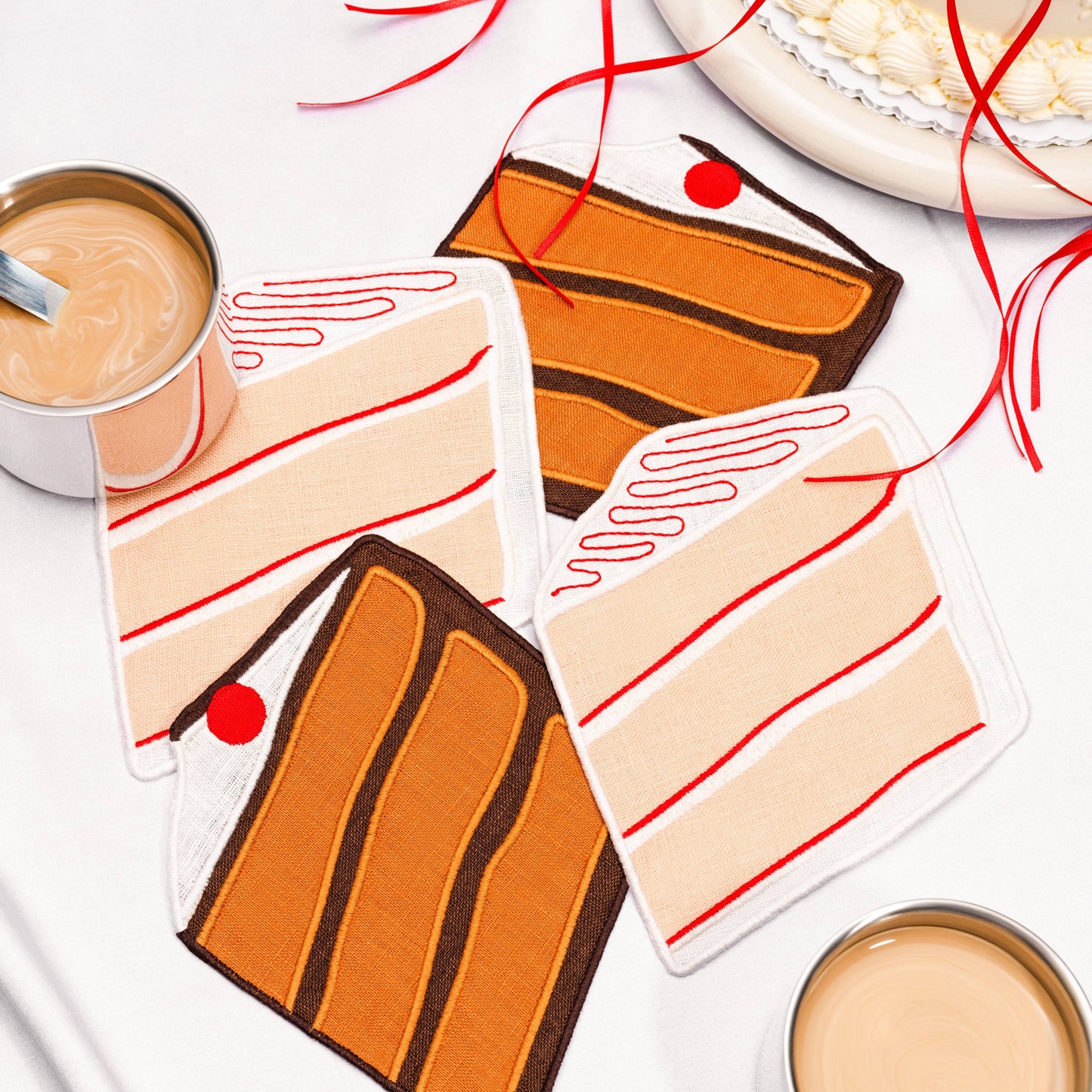 Napkin cake slices and coffee cups on a white background