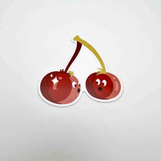 Cherry sticker. Each berry has a face and they are looking at each other.