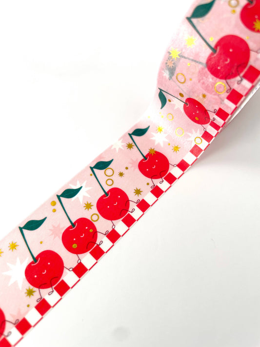 pink washi tape with gold foil accents and red cherries on it