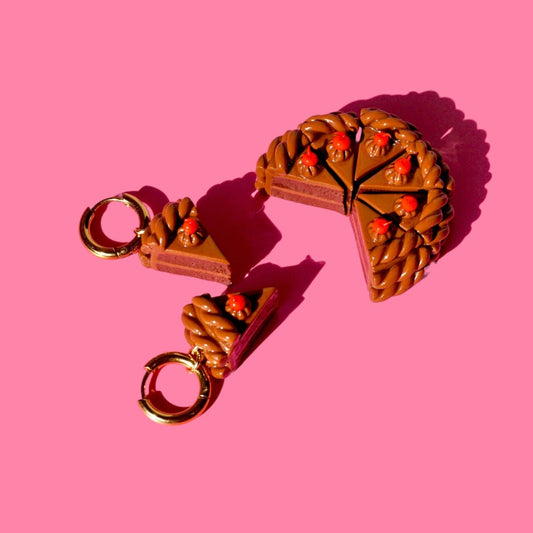 Chocolate cake huggies on a pink background