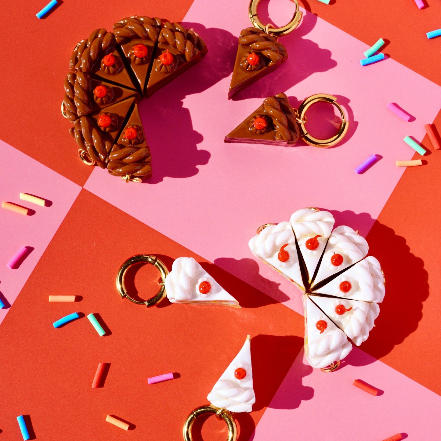 Cake earrings on a colorful background with sprinkles