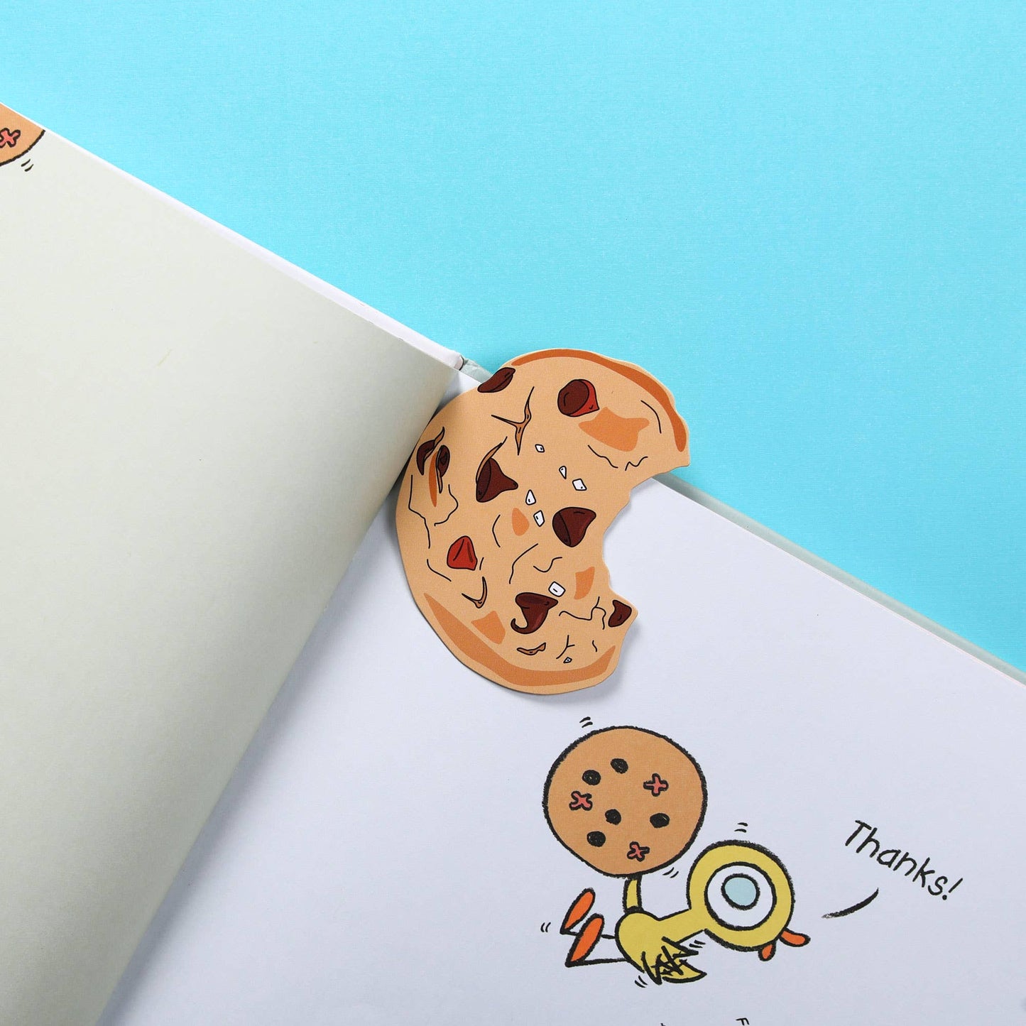 Bookmark made to look like a bitten chocolate chip cookie.