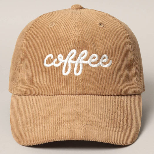 tan/light brown corduroy baseball hat with white embroidered text on it that says "coffee"