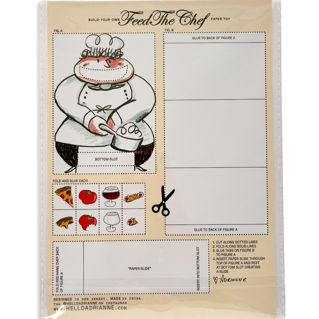 Bonus cardboard cutout labeled "Build-Your-Own... Feed The Chef... Paper Toy" with the image of a smiling chef and tiny foods (pizza, wine, tomato, cannoli) to cut out and feed him with. Instructions printed for assembly.