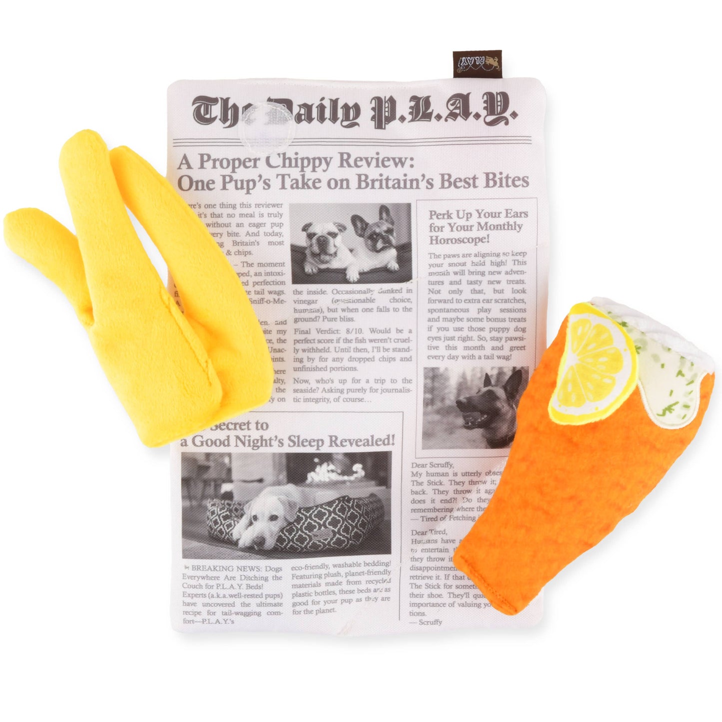 Two dog toys, one yellow and one orange with a lemon slice design, on top of a newspaper that is also a dog toy.
