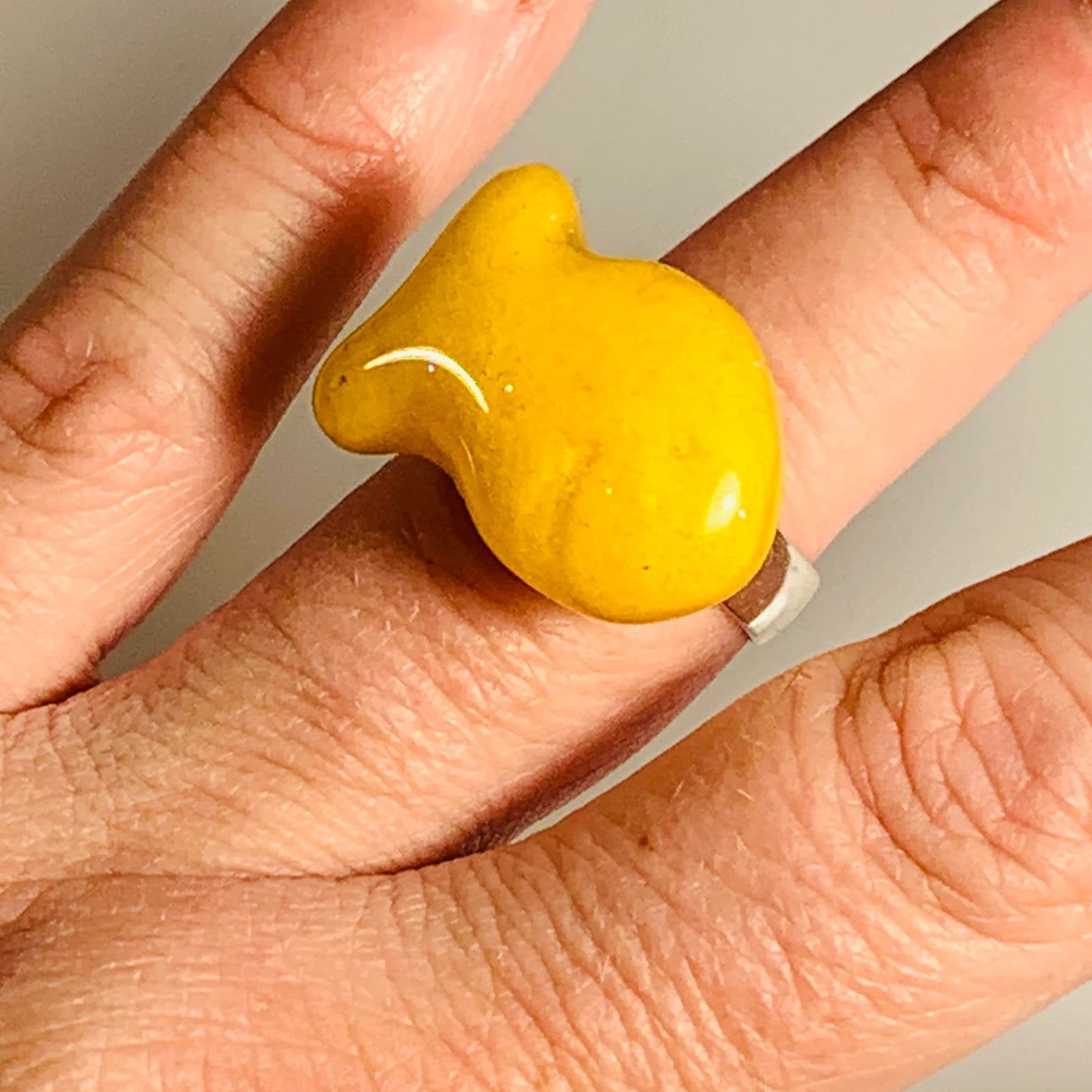 Goldfish snack ring worn on left ring finger 