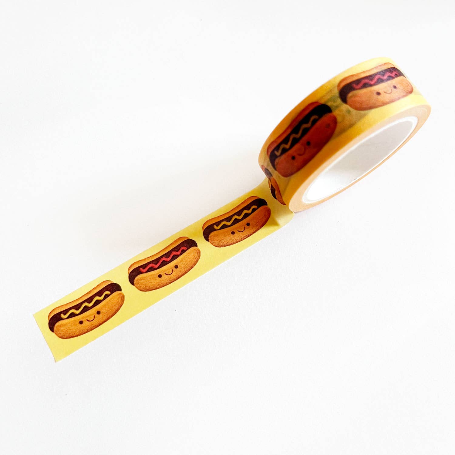 yellow washi tape with smiley hot dogs on them