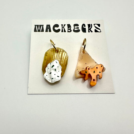 Chip and Dip mismatched earring set. One is a ruffle with a sourcream and chive dip, and the other is a tortilla chip with nacho cheese sauce. Gold hoops.  By Machbecks.
