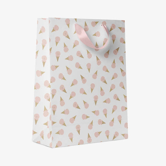 Gift bag with pink, satin ribbon handles. Bag print has pink ice cream cones all over it
