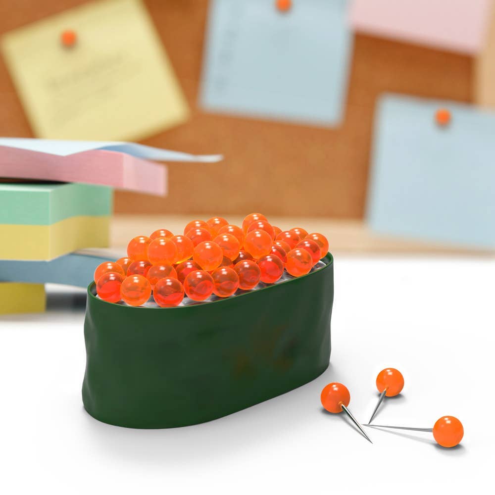 Ikura maki sushi pushpins/thumbtacks -- made to look like maki sushi where the salmon roe on top are actual pushpins