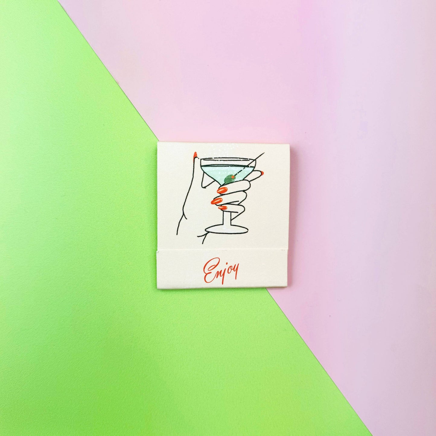 Matchbook in Dirty Martini theme. Each match is an ingredient in making this classic cocktail. Recipe is also written inside the matchbook. Book also says Enjoy.