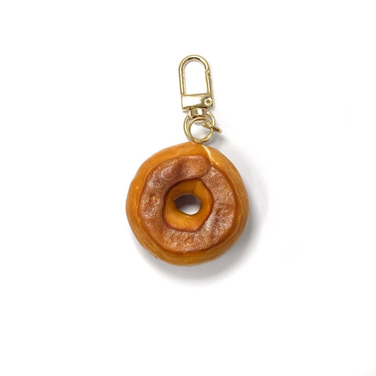 Keychain shaped like a realistic bagel (back view).