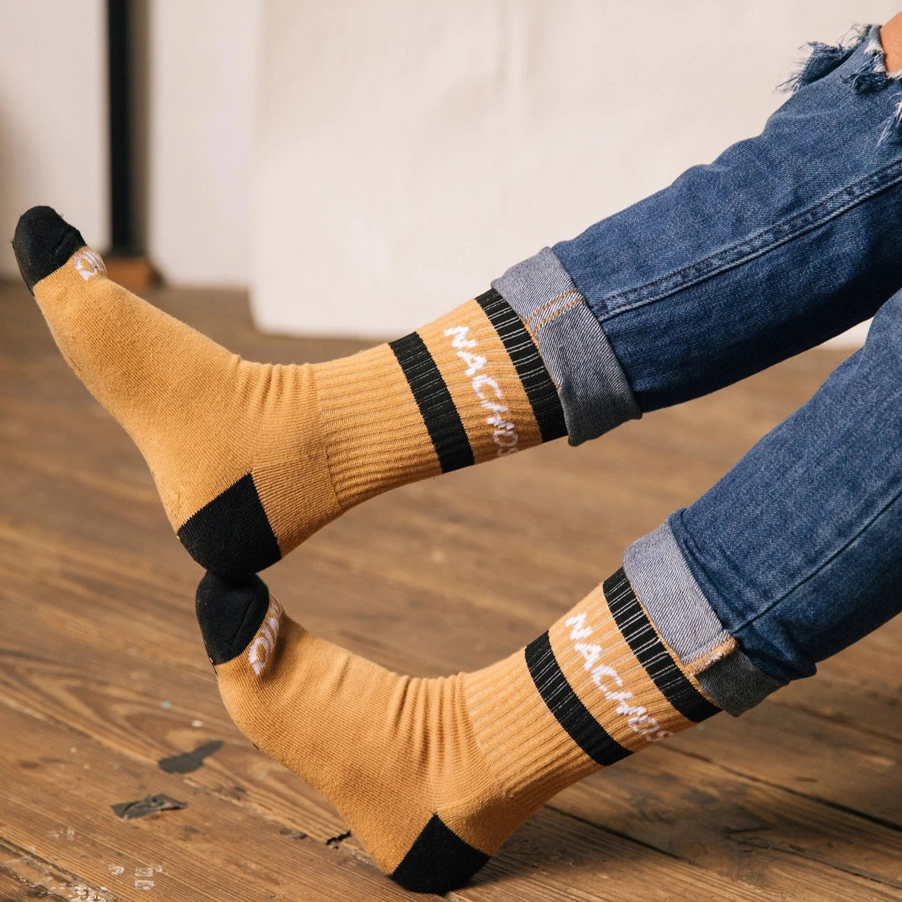 Nachos Socks are on model's feet.