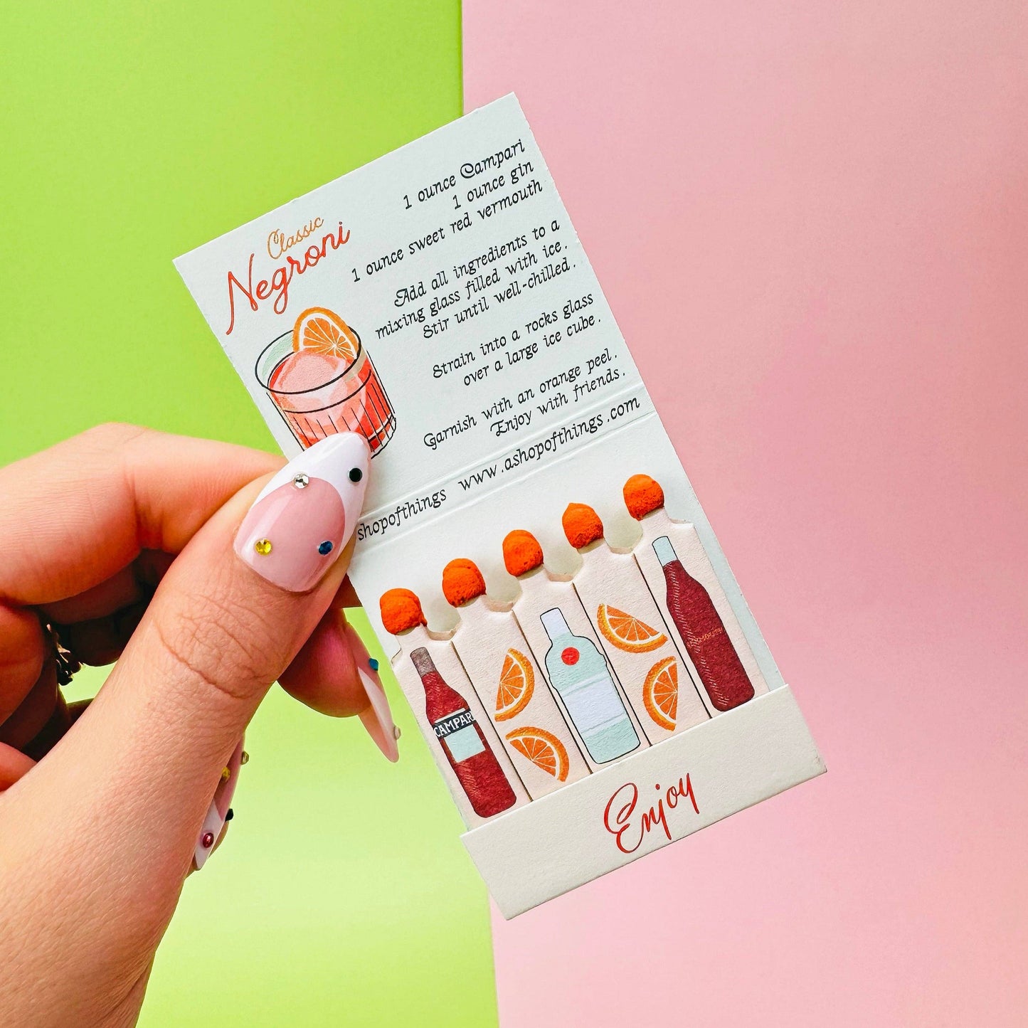 Close up of interior of negroni matchbook + negroni recipe