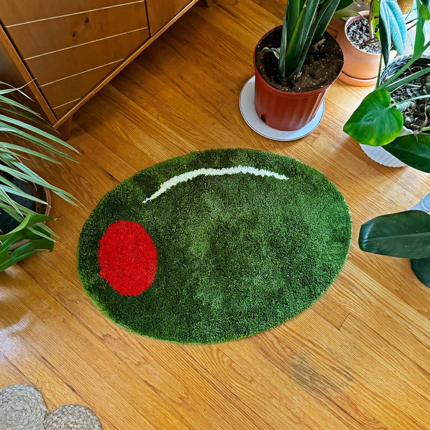 Stuffed green olive rug