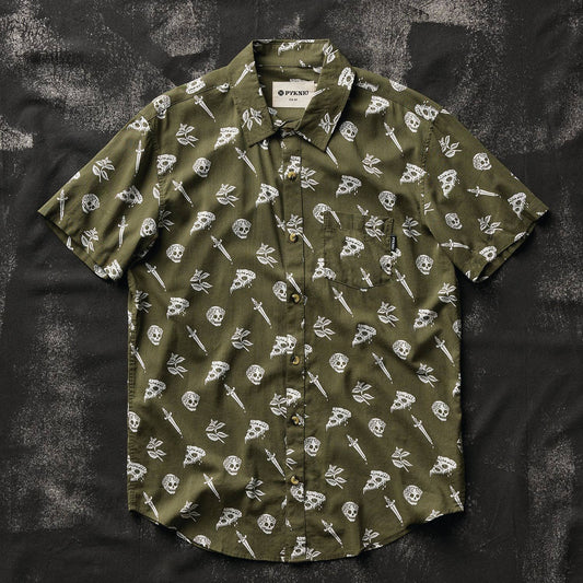 button up shirt that is oregano green with skulls, pizza and swords on it.
