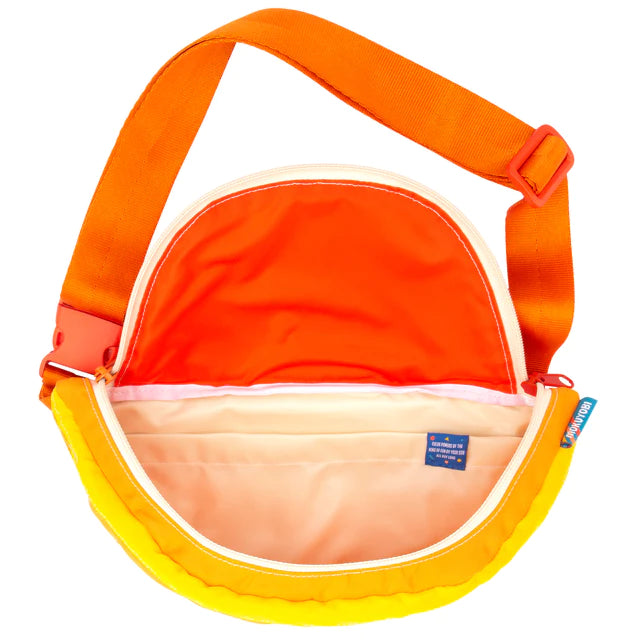 Interior of ruby red grapefruit fanny sling bag