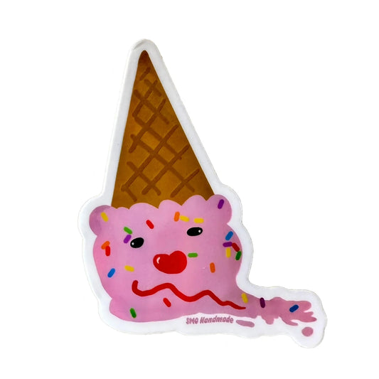 a melted and upside down pink ice cream cone with sprinkles