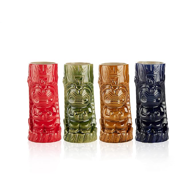 Four colorful tiki mugs with different designs on a white background