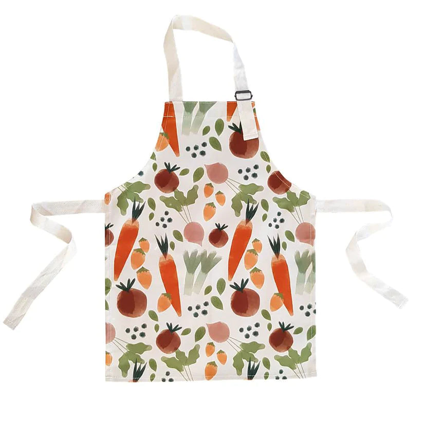 Children size apron with veggie print all over