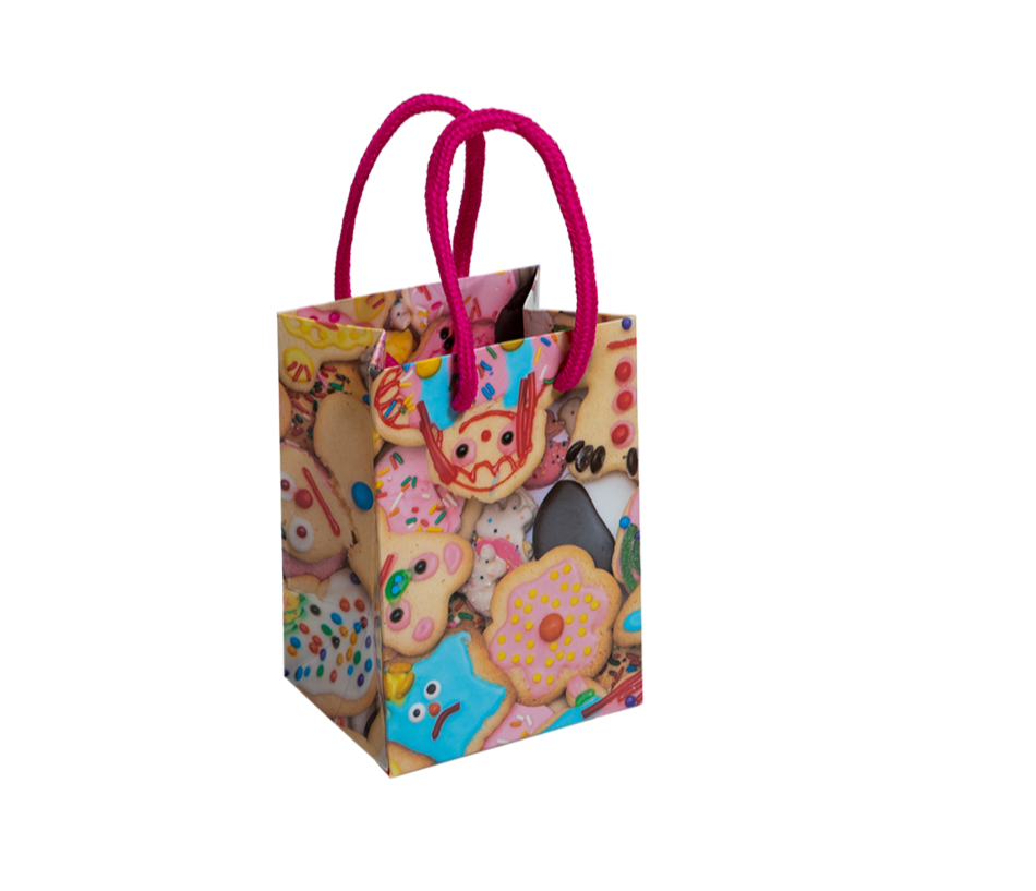 Small gift bag with colorful design and pink handles on a white background