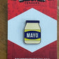 Mayo jar lapel pin on a card backing that says Deli Fresh Threads.