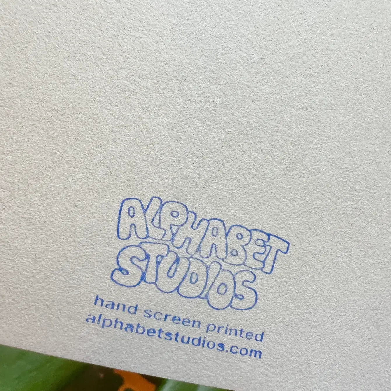Back of birthday pancakes greeting card. Stamped logo -- says "Alphabet Studios hand screen printed. alphabetstudios.com"