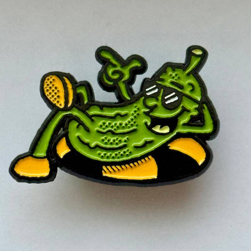 Green and yellow pickle cartoonish character on a white background