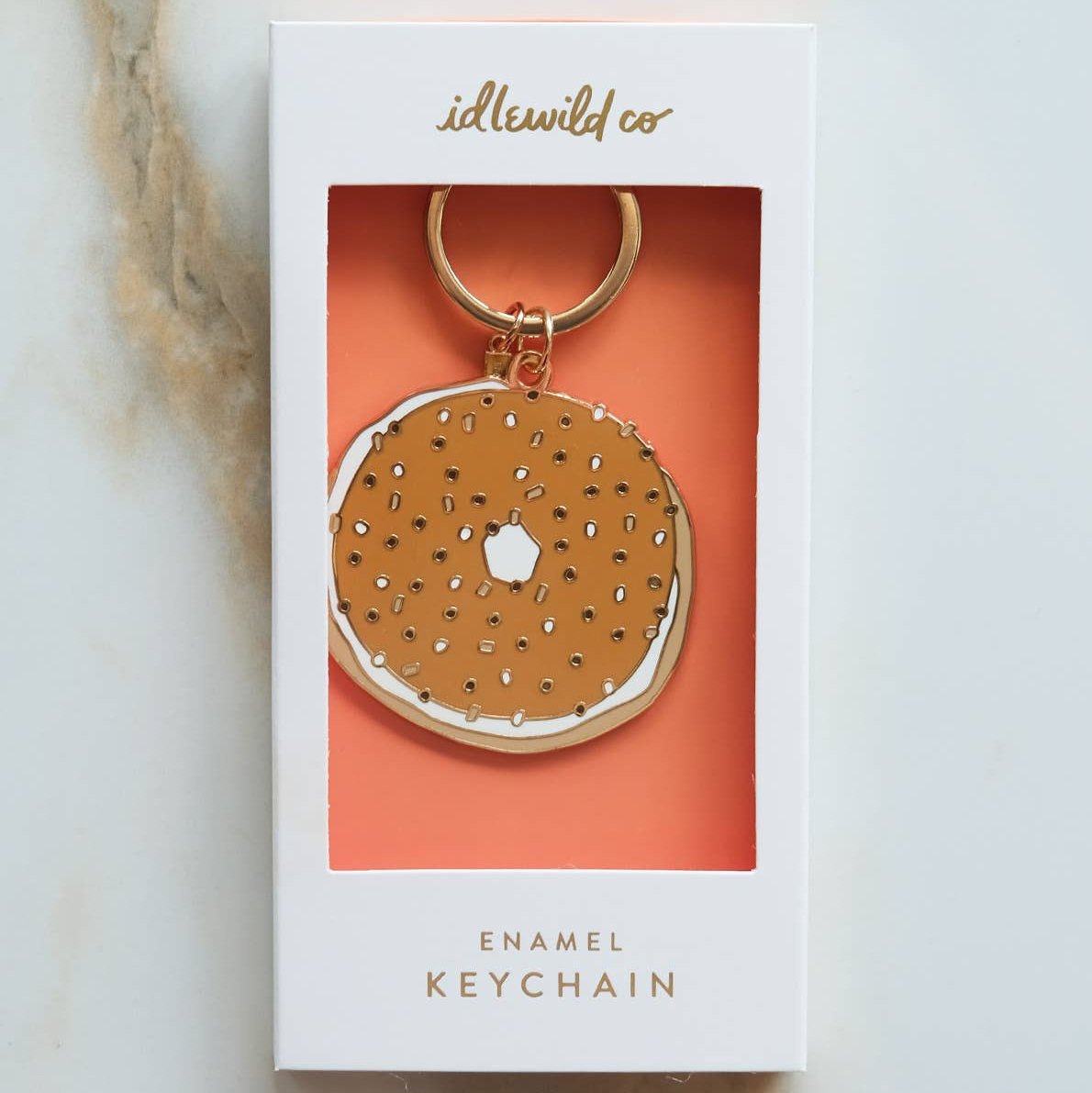 bagel enamel keychain in box packaging