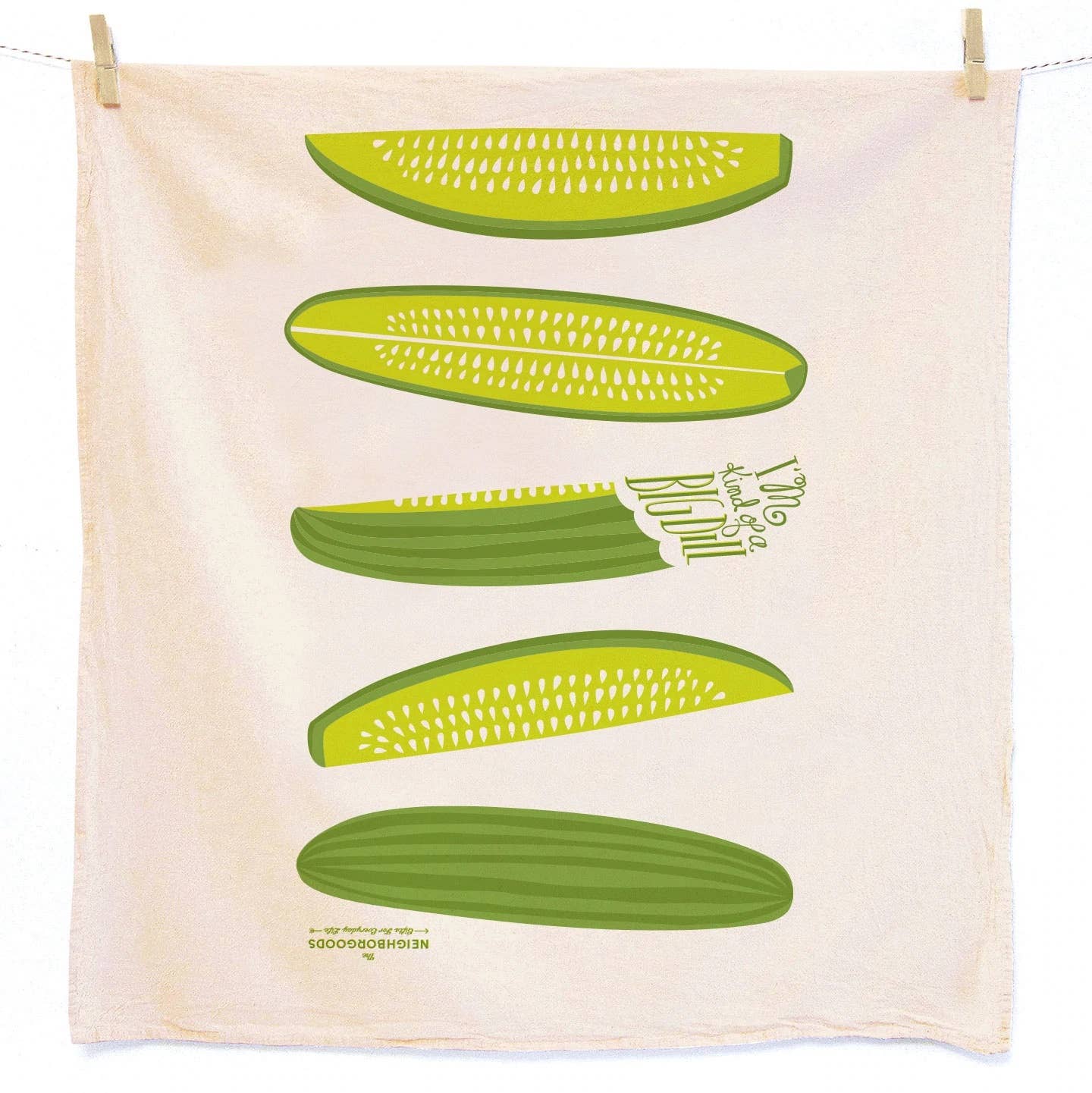 Towel with green pickle spear illustrations and text on a white background