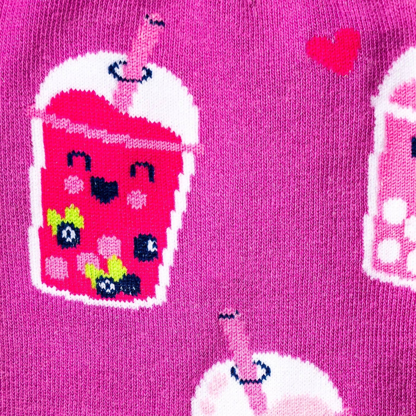 Pink socks with colorful boba bubble tea drink illustrations and heart patterns