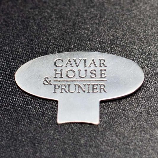 Back of caviar tin opener
