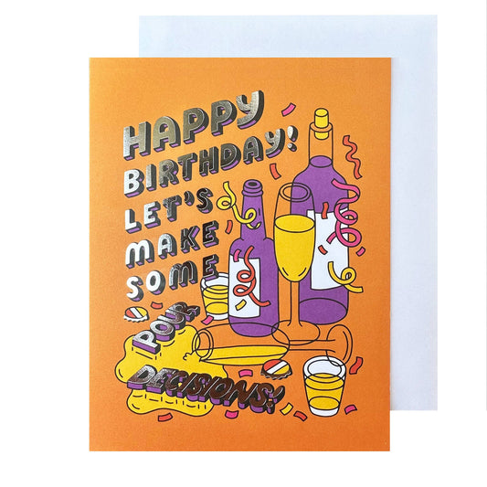 Birthday greeting card with a beer and wine bottle, along with a spilt champagne flute. Text reads "Happy birthday! Let's make some pour decisions!" 