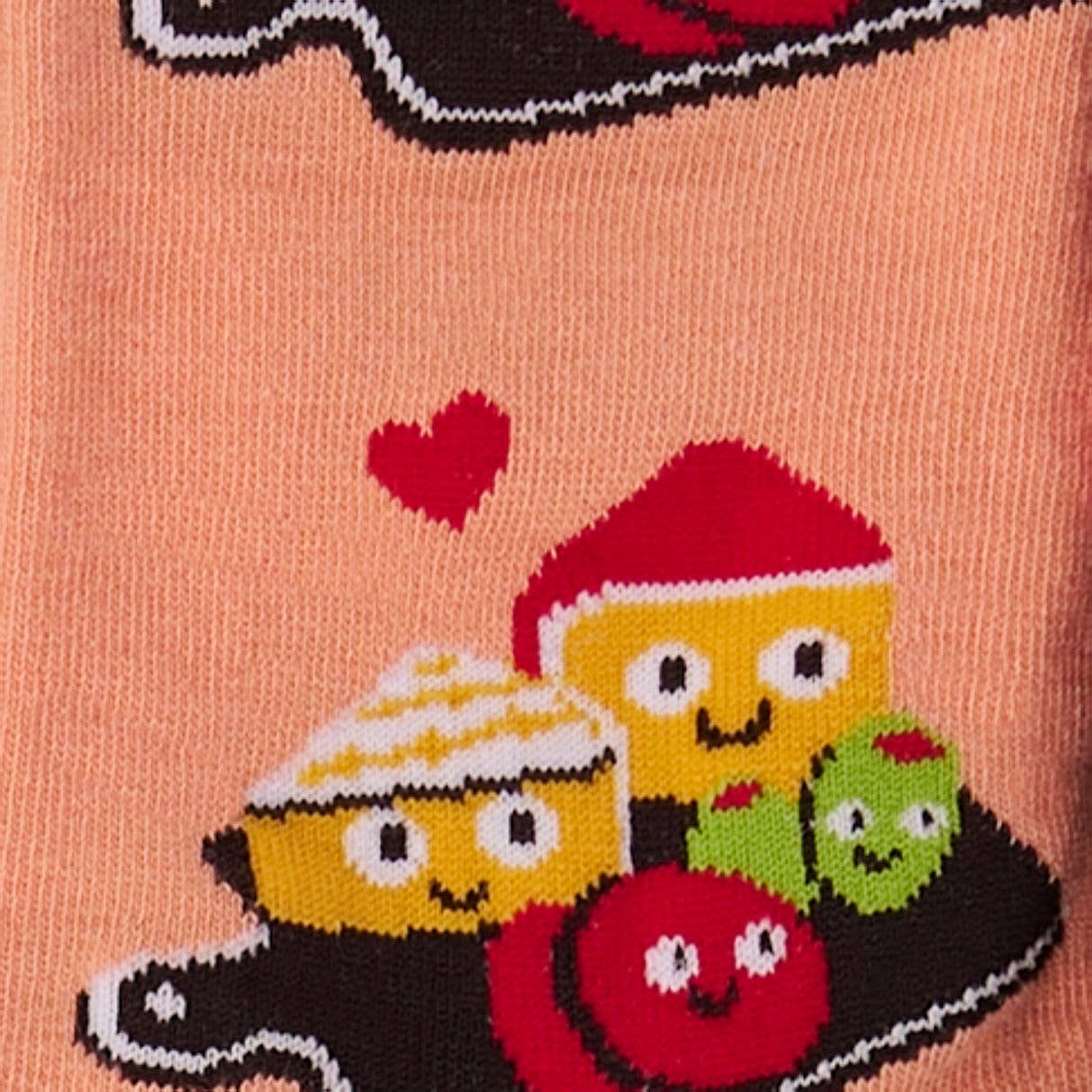 Up close detail of pair of pink and burgundy socks with cartoon illustration of a charcuterie board design and text (char-CUTE-erie) on a white background