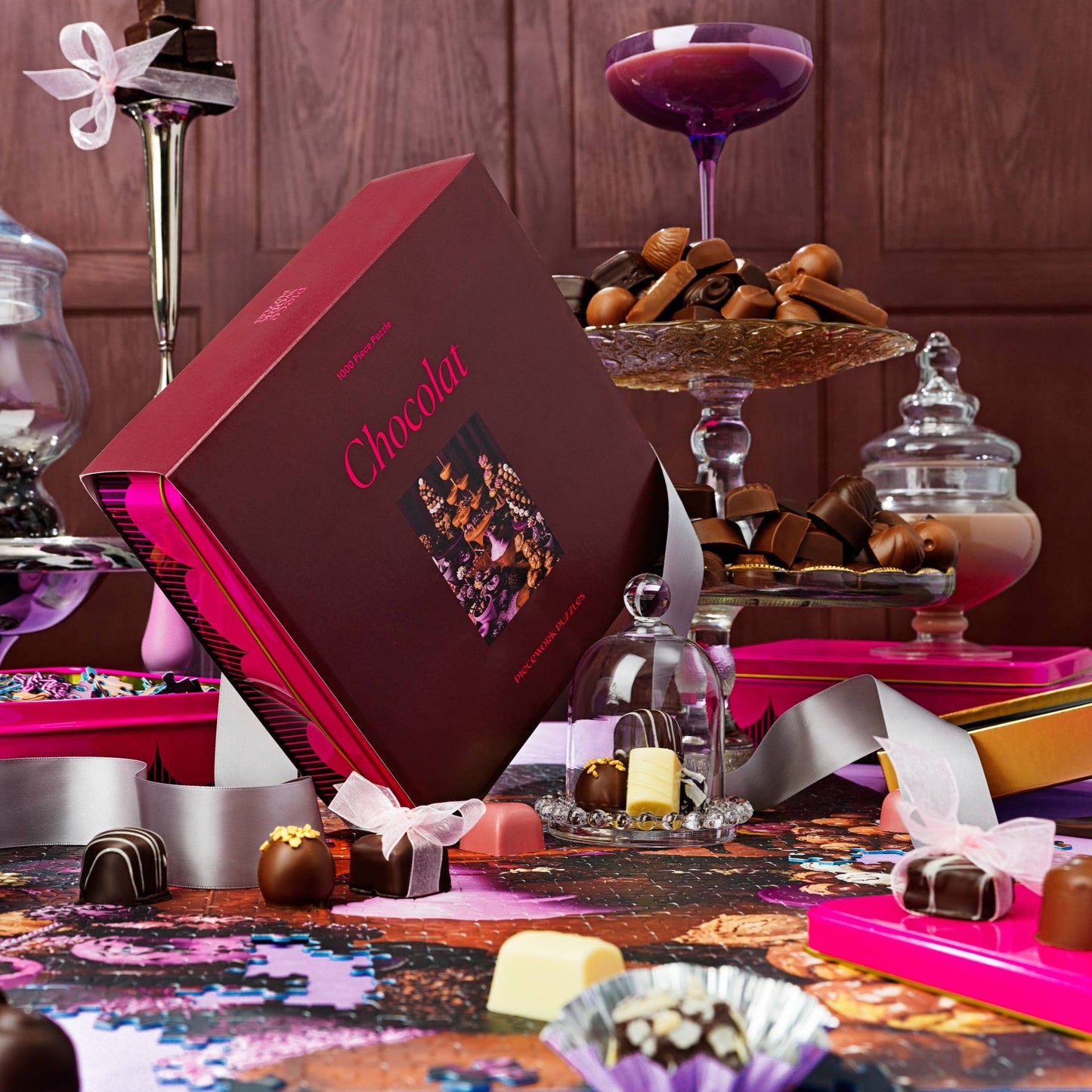Puzzle tin shown on a dessert table