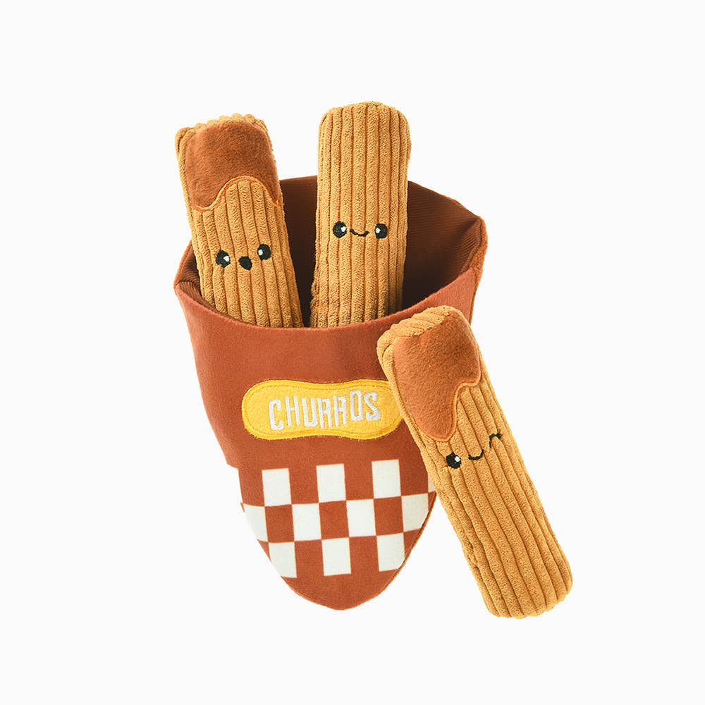 Plush churros dog toy featuring a container labeled 'Churros' with 3 individual churro toys on a white background