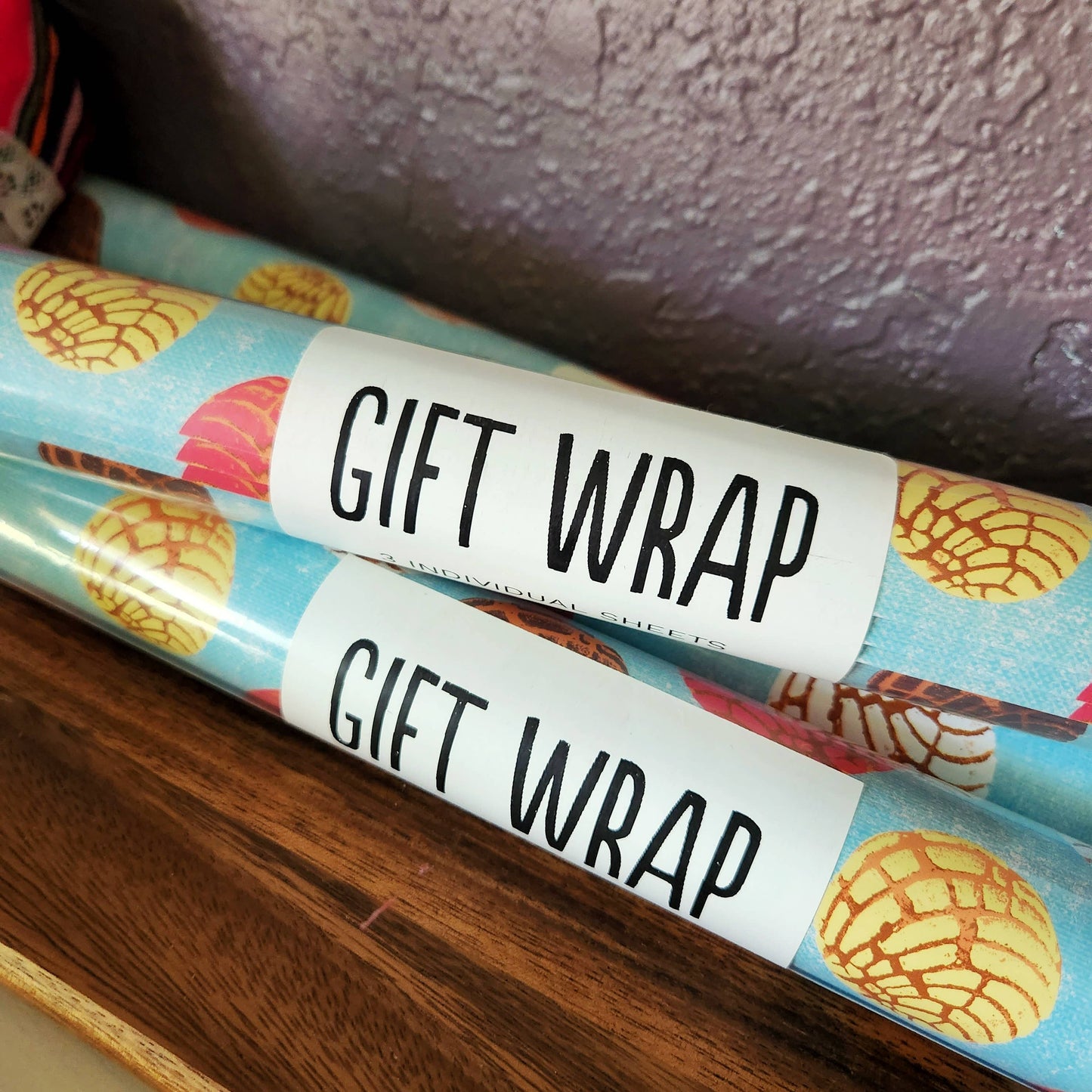 Concha gift wrap rolled in the dube that it comes in.