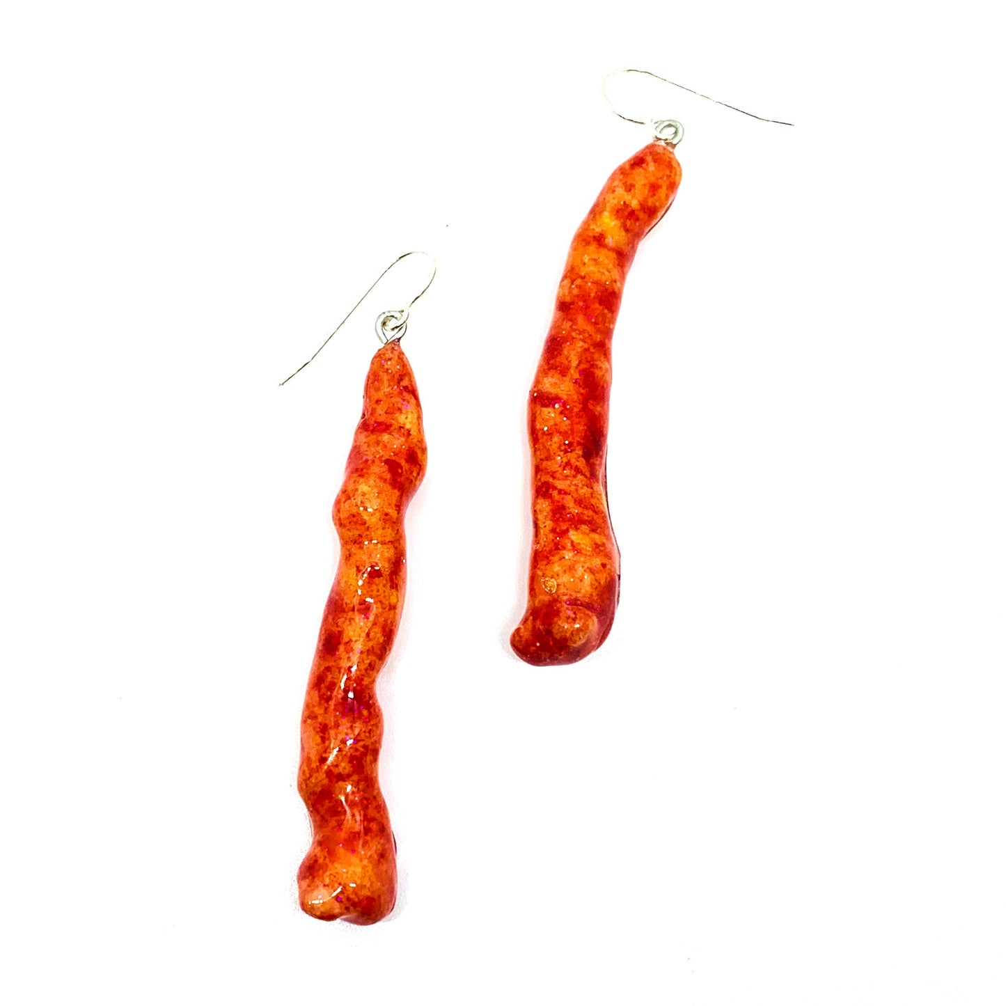 Pair of hot cheetos coated in resin and turned into earrings