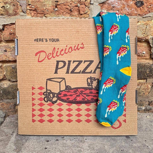 image of the deep dish pizza socks laying on a brown pizza box