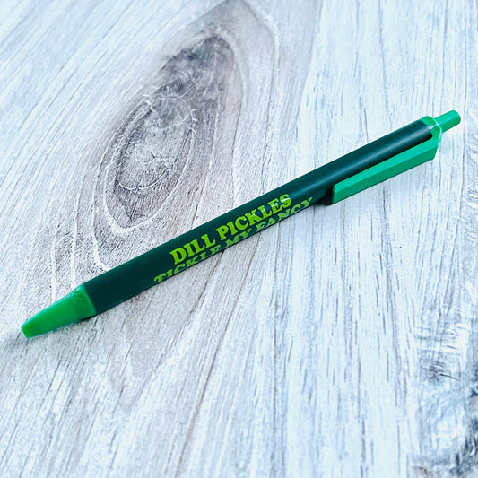 dark and light green pen with text on it that reads "Dill pickles tickle my fancy"