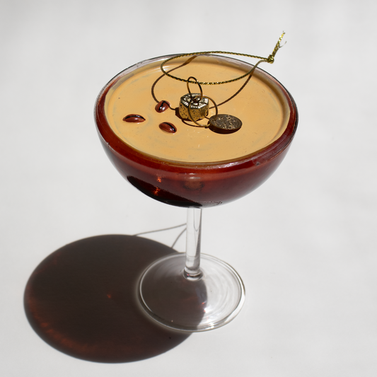 Espresso martini cocktail ornament on a white background