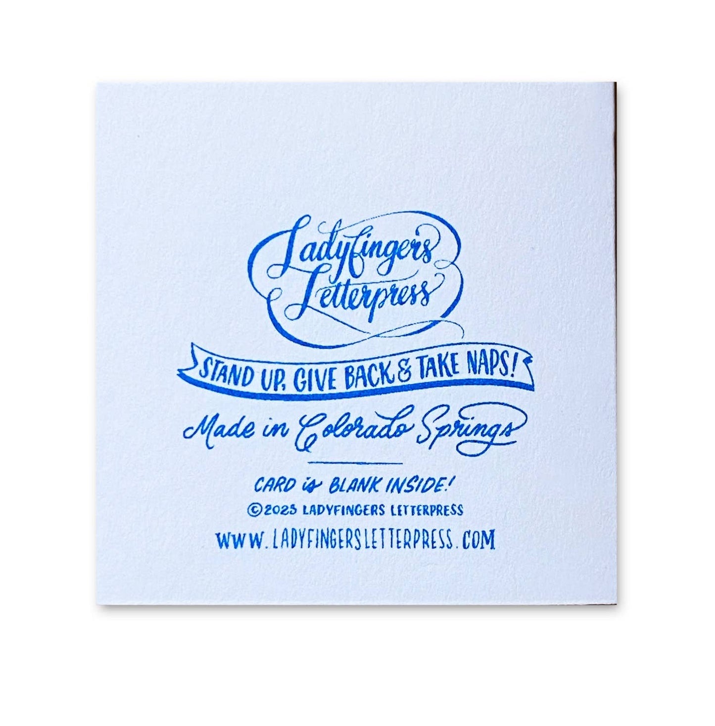 back of espresso tiny card with branding and copyright information