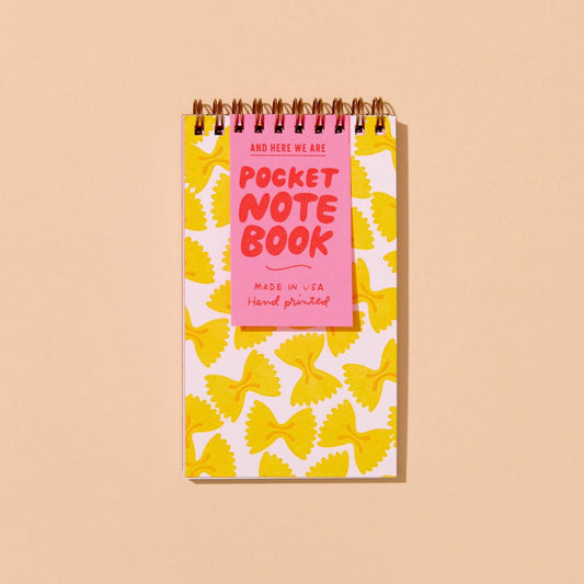 small, spiral bound notebook with a farfalle pasta design