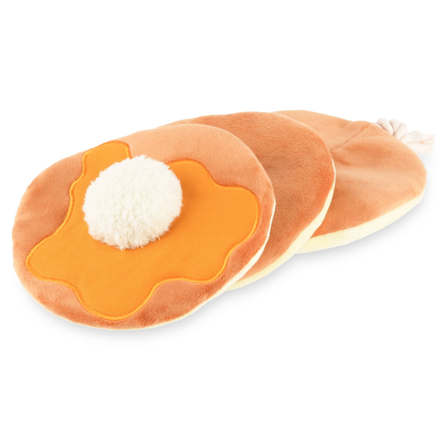 Dog toy that resembles a stack of 3 pancakes, strung together by a rope with a white ball center imitating a pad of butter, photographed on a white background