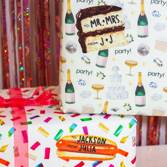 cake slice and hot dog gift tag stickers on festive wrapped gifts